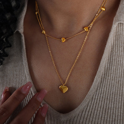 Collar Corazón Doble: Amuleto de Amor y Protección