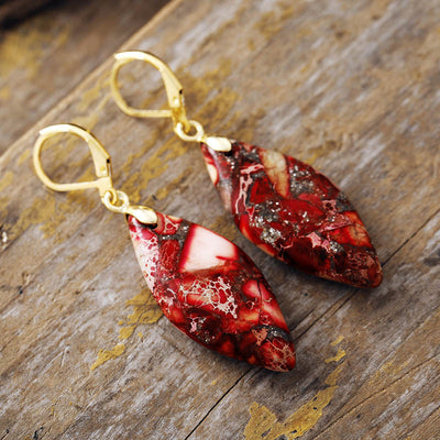 Brilla con Vitalidad y Optimismo: Pendientes de Goldstone Rojo Natural