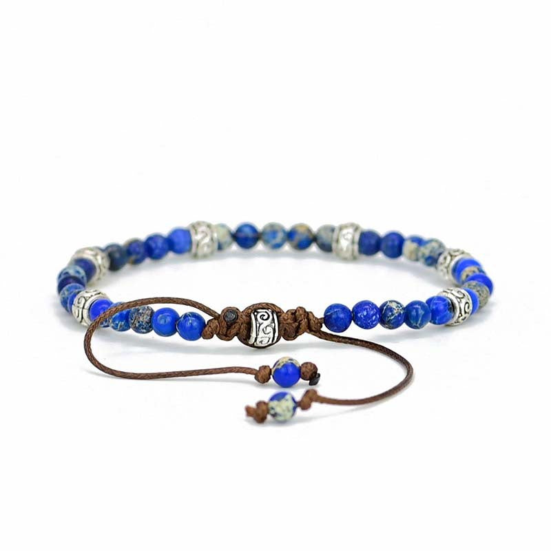 Pulsera Ajustable de Lapis Lazuli Natural con Detalles Étnicos Plateados