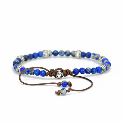 Pulsera Ajustable de Lapis Lazuli Natural con Detalles Étnicos Plateados