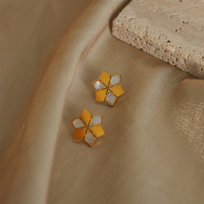 Pendientes de acero de titanio: Energía pura y luz en tu día a día