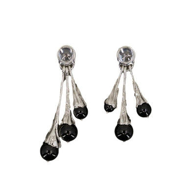 Energía protectora y estilo: Pendientes de obsidiana negra para mujer