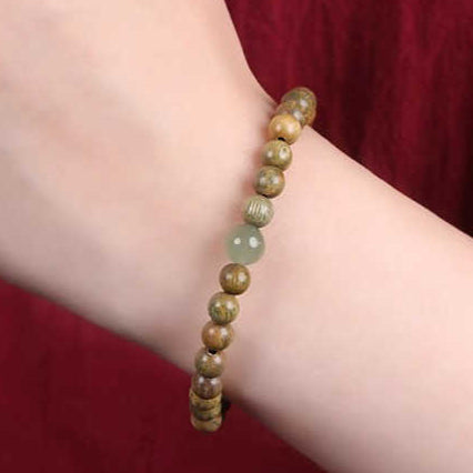 Pulsera de sándalo verde y turmalina: armonía y energía espiritual en tu día a día