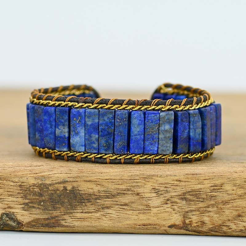 Pulsera de cadena larga con lapislázuli y cuero trenzado, sabiduría ancestral y estilo bohemio