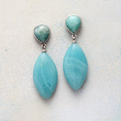 Pendientes de gota de cristal: Claridad y elegancia para tu bienestar