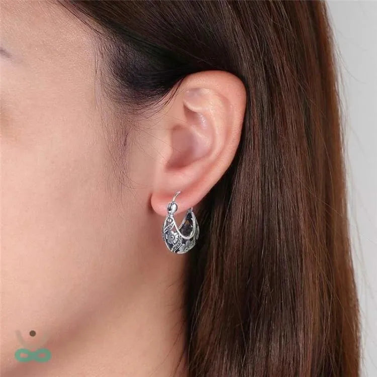 Pendientes Florales de Plata – Elegancia Espiritual y Sabiduría Atemporal