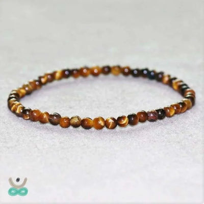 Pulsera Delgada de Ojo de Tigre – Protección y Fuerza en tu Día