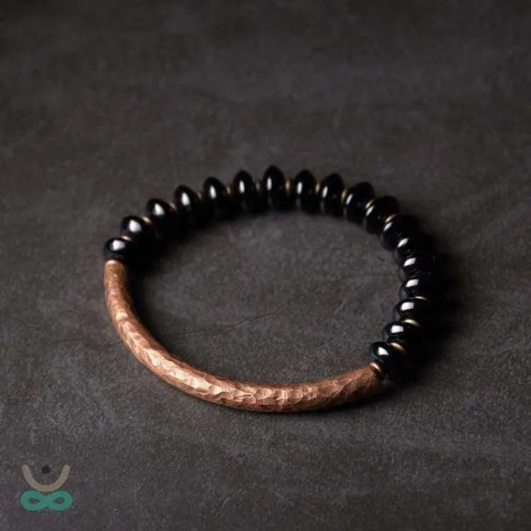 Pulsera "Resiliencia" en Cobre y Ónix – Fuerza, Equilibrio y Protección