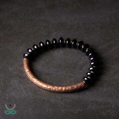 Pulsera "Resiliencia" en Cobre y Ónix – Fuerza, Equilibrio y Protección