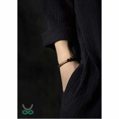 Pulsera "Resiliencia" en Cobre y Ónix – Fuerza, Equilibrio y Protección