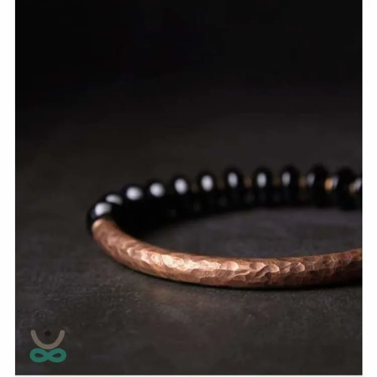 Pulsera "Resiliencia" en Cobre y Ónix – Fuerza, Equilibrio y Protección