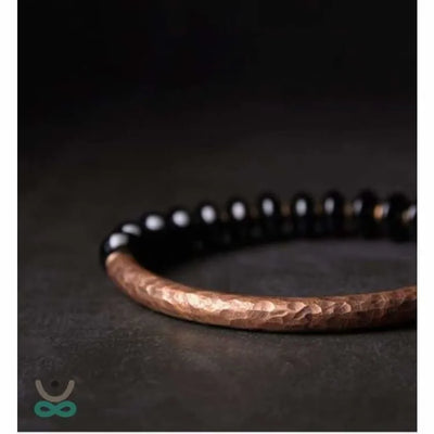 Pulsera "Resiliencia" en Cobre y Ónix – Fuerza, Equilibrio y Protección