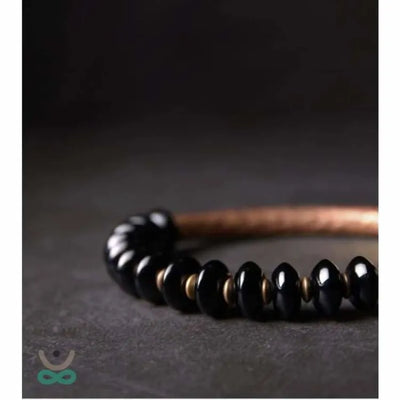 Pulsera "Resiliencia" en Cobre y Ónix – Fuerza, Equilibrio y Protección