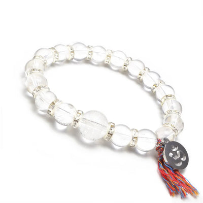Pulsera Tibetana de Cristal Natural Grabado – Elegancia y Energía en una Joya Única