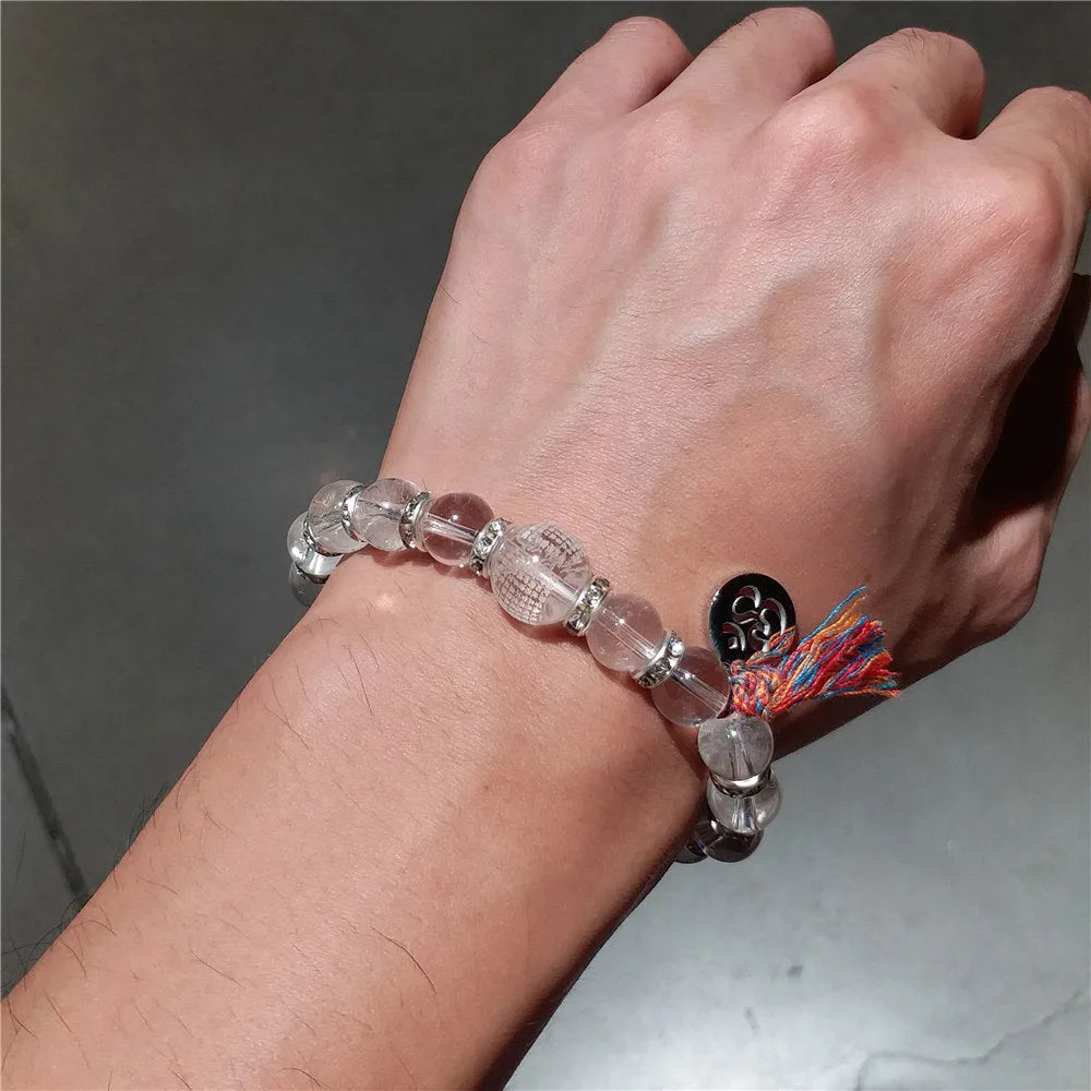 Pulsera Tibetana de Cristal Natural Grabado – Elegancia y Energía en una Joya Única