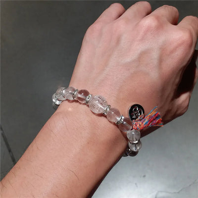 Pulsera Tibetana de Cristal Natural Grabado – Elegancia y Energía en una Joya Única