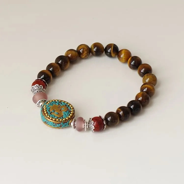 Pulsera budista con piedras de ojo de tigre