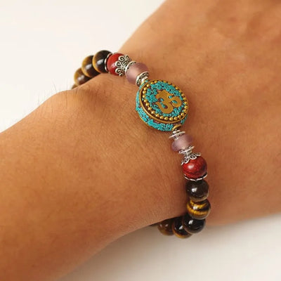 Pulsera budista con piedras de ojo de tigre