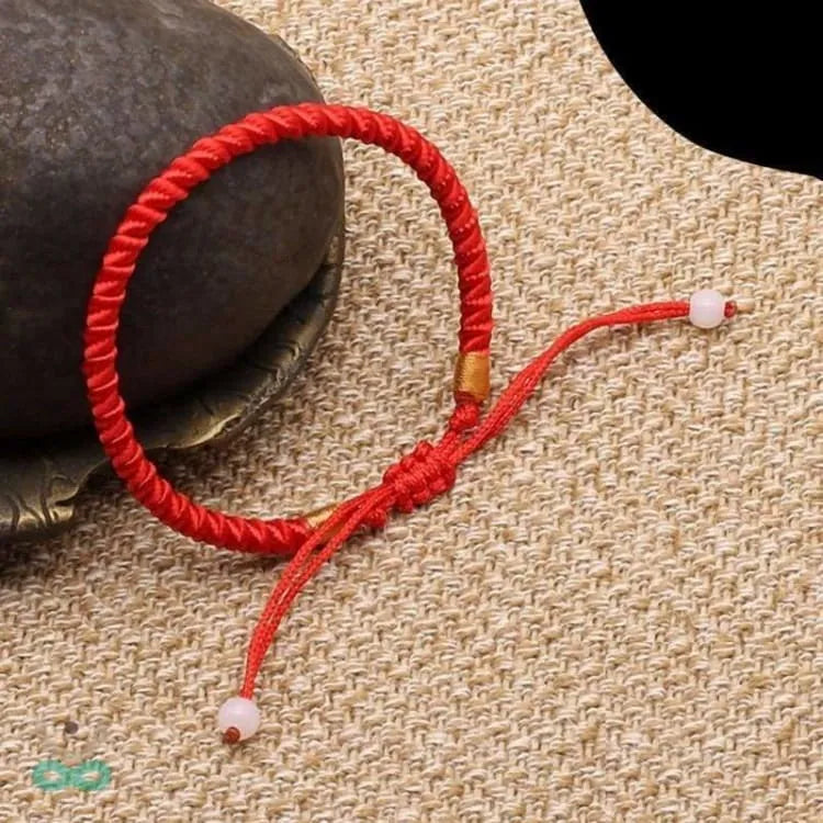 Pulsera de la Suerte Trenzada con Hilo Rojo