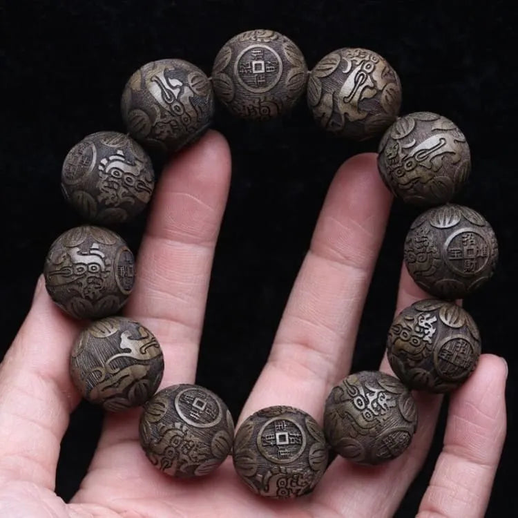 Pulsera de madera de los antepasados