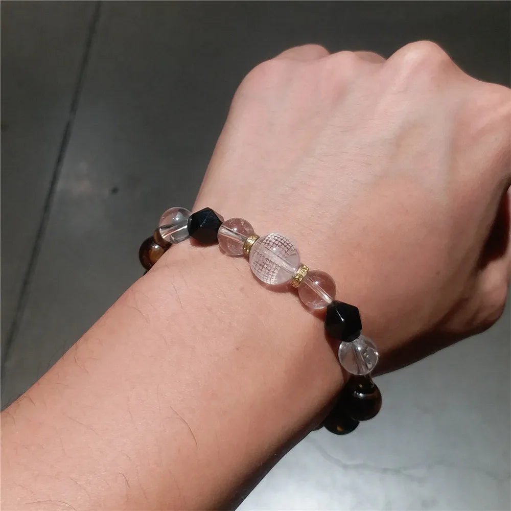 Pulsera de ojo de tigre con bola de cristal