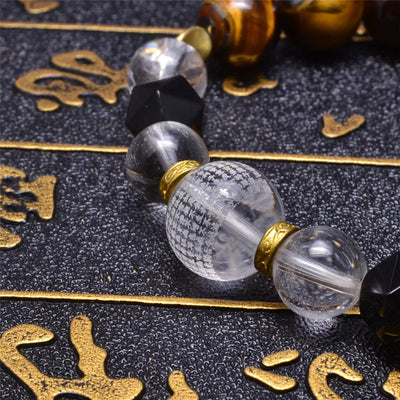 Pulsera de ojo de tigre con bola de cristal