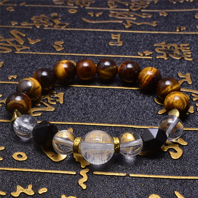 Pulsera de ojo de tigre con bola de cristal