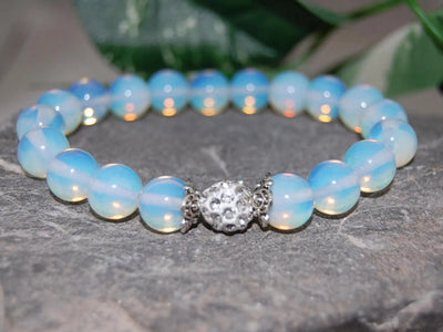 Pulsera de piedra lunar con piedra volcánica azul