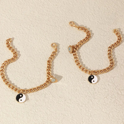 Pulsera dorada de pareja con colgante yin yang