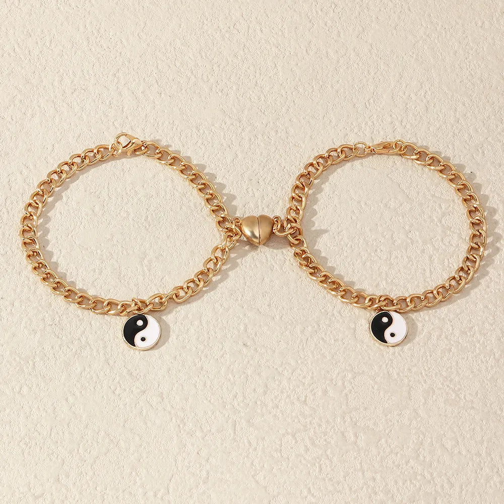 Pulsera dorada de pareja con colgante yin yang