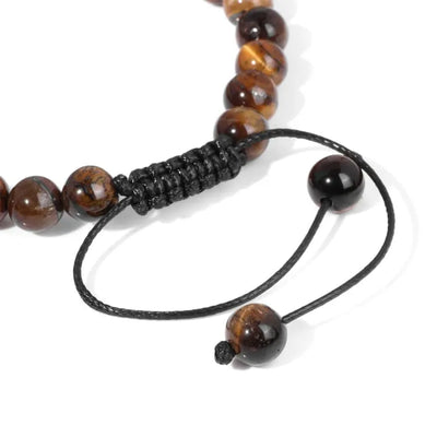 Pulsera en ojo de tigre con corona