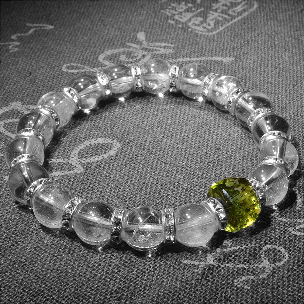 Pulsera tibetana con grabado sánscrito en cristal