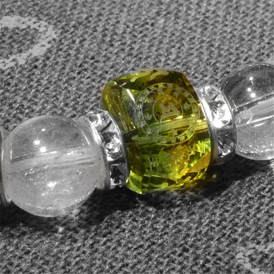 Pulsera tibetana con grabado sánscrito en cristal