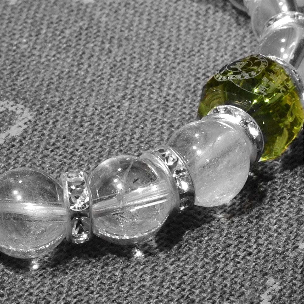 Pulsera tibetana con grabado sánscrito en cristal